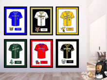 Load image into Gallery viewer, Custom framed sports jerseys displayed on wall for coaching milestones