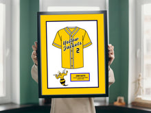 Load image into Gallery viewer, a person holding a framed picture of a baseball uniform